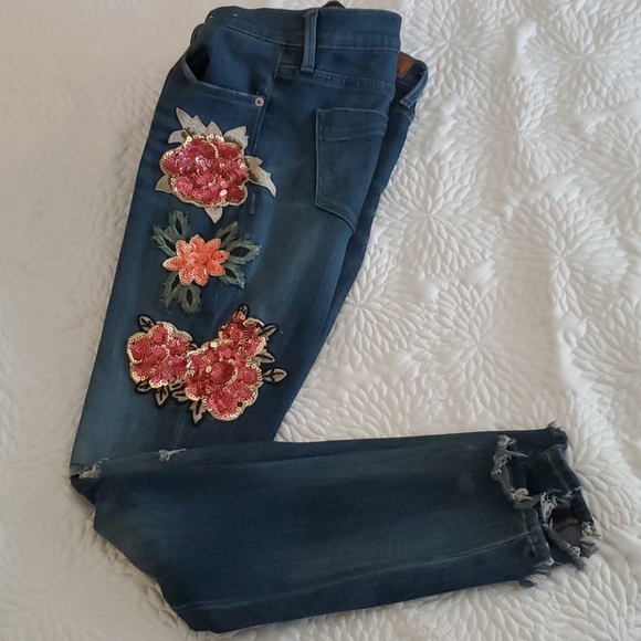Express distressed jeans with floral decals